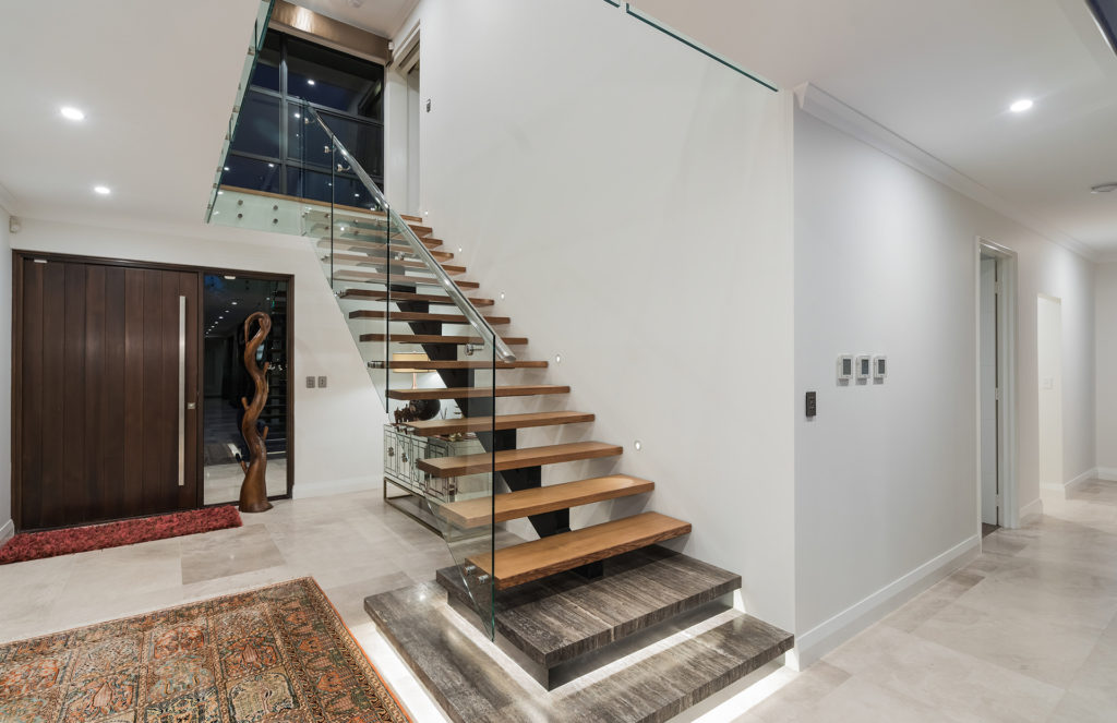 Open spine staircase with timber treads